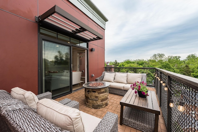 218 W Kingsley St Unit 507, Ann Arbor, MI 48103 - balcony featuring an outdoor living space with a fire pit