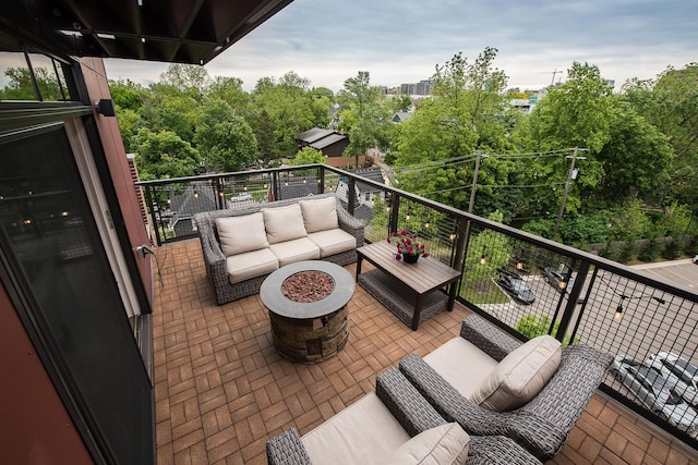 218 W Kingsley St Unit 507, Ann Arbor, MI 48103 - balcony with an outdoor living space with a fire pit
