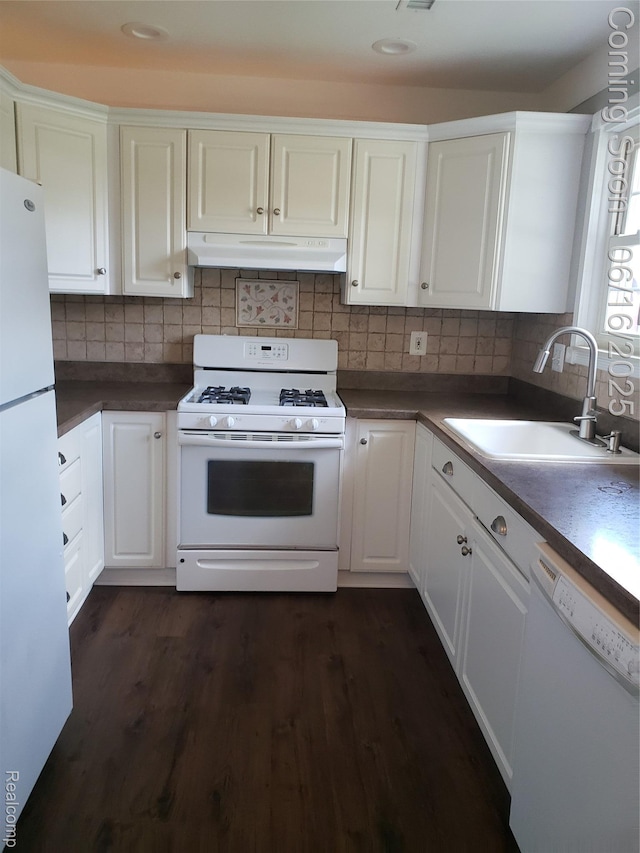 8224 Milburn St, Westland, MI 48185 - kitchen featuring white appliances, under cabinet range hood, white cabinetry, decorative backsplash, and dark wood-style floors