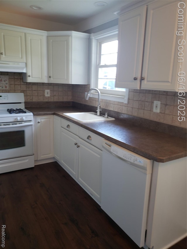 8224 Milburn St, Westland, MI 48185 - kitchen featuring white appliances, dark countertops, white cabinets, dark wood finished floors, and under cabinet range hood