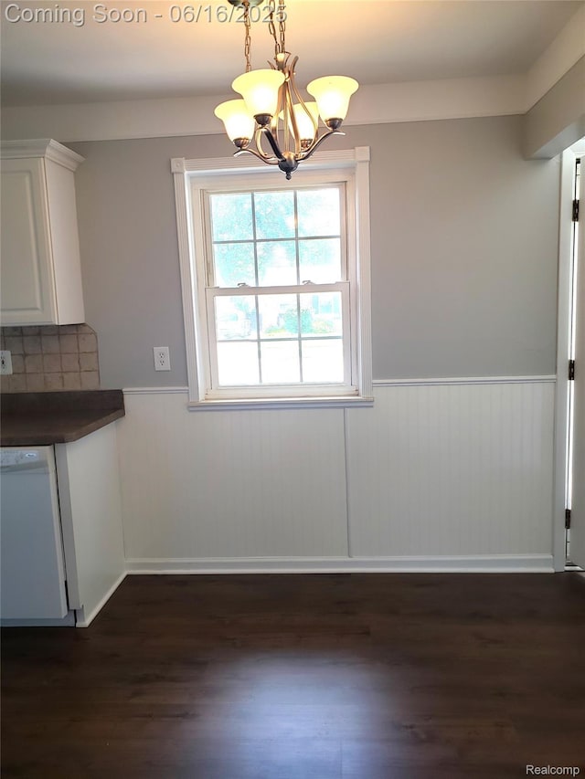8224 Milburn St, Westland, MI 48185 - unfurnished dining area featuring a wainscoted wall, a chandelier, and dark wood-style flooring