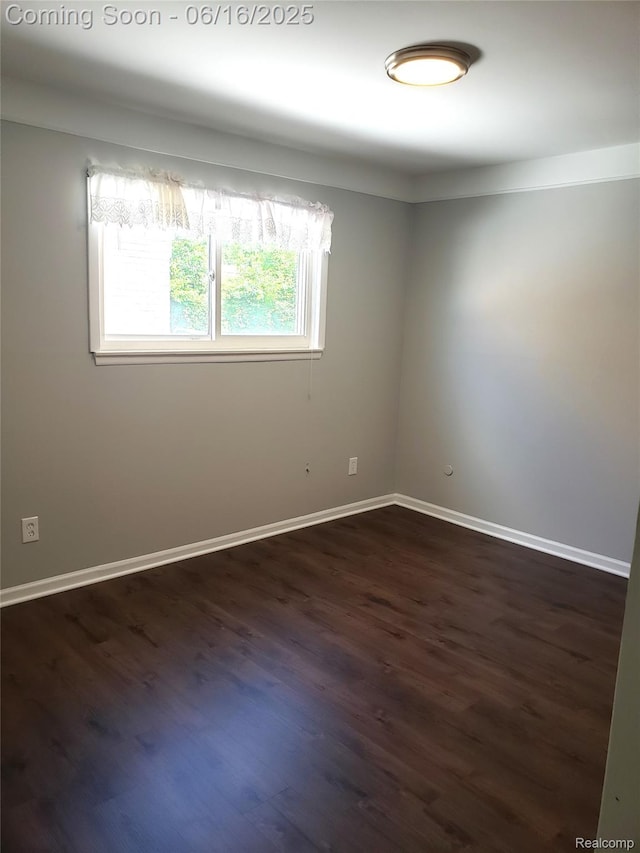 8224 Milburn St, Westland, MI 48185 - unfurnished room with dark wood finished floors and baseboards