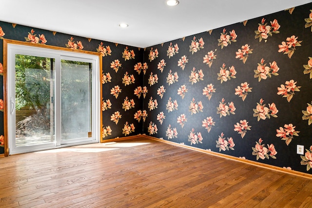 4693 Gallagher Rd, Rochester, MI 48306 - spare room with hardwood / wood-style floors, recessed lighting, baseboards, and wallpapered walls