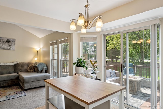 43687 Christopher Ct, Canton, MI 48188 - dining space with a chandelier and vaulted ceiling