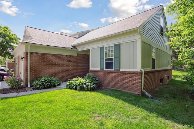 43687 Christopher Ct, Canton, MI 48188 - view of side of home featuring brick siding, a lawn, and roof with shingles