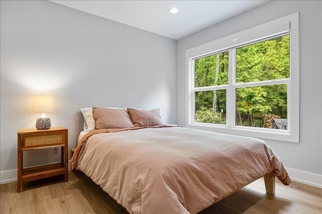 4067 Hillside Trl, New Buffalo, MI 49117 - bedroom with baseboards, light wood finished floors, and recessed lighting