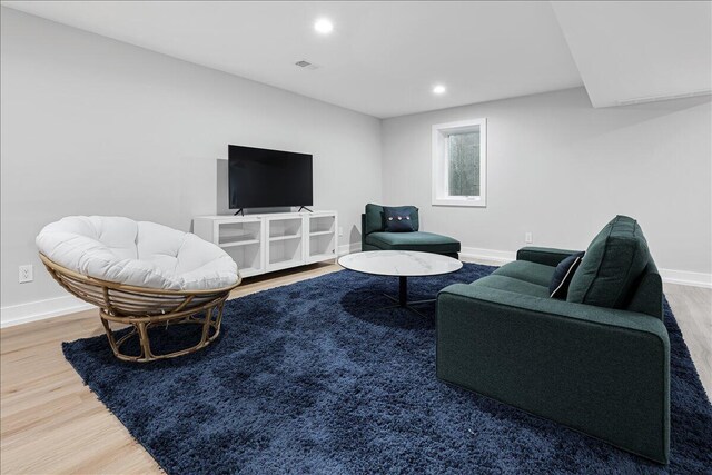 4067 Hillside Trl, New Buffalo, MI 49117 - living area featuring wood finished floors, baseboards, and recessed lighting