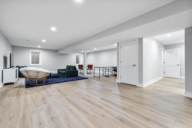4067 Hillside Trl, New Buffalo, MI 49117 - living area with light wood-style floors, baseboards, and recessed lighting