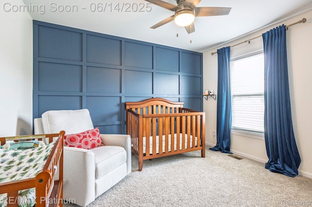 2858 Au Gres River Dr, Fowlerville, MI 48836 - bedroom with a decorative wall, light carpet, baseboards, and a crib