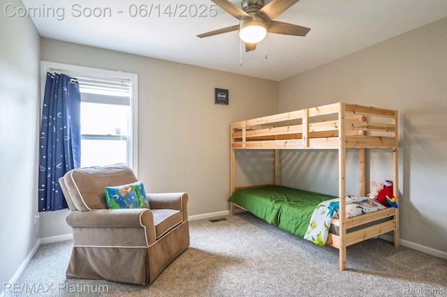 2858 Au Gres River Dr, Fowlerville, MI 48836 - bedroom with carpet floors, baseboards, and a ceiling fan