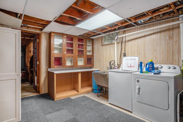 4468 Teal Ln, Newaygo, MI 49337 - laundry room with washing machine and dryer and wood walls