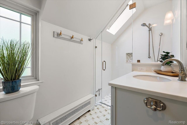 676 Washington Rd, Grosse Pointe, MI 48230 - full bath featuring toilet, lofted ceiling, a shower stall, vanity, and a skylight