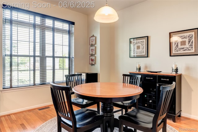 2327 Cherry Tree Ln, Grand Blanc, MI 48439 - dining area with light wood-type flooring and baseboards