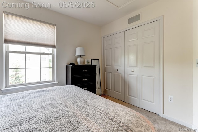 2327 Cherry Tree Ln, Grand Blanc, MI 48439 - bedroom featuring a closet, carpet flooring, and baseboards