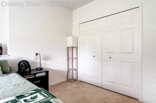 2327 Cherry Tree Ln, Grand Blanc, MI 48439 - bedroom featuring light colored carpet, a closet, and baseboards