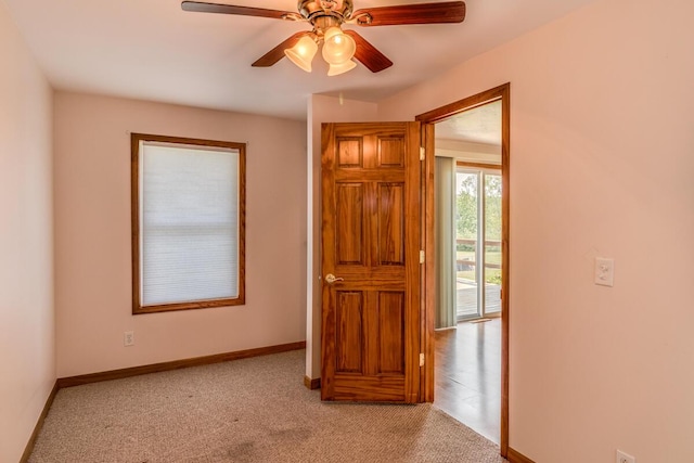 11883 Scott Park Rd, Delton, MI 49046 - carpeted spare room with a ceiling fan and baseboards