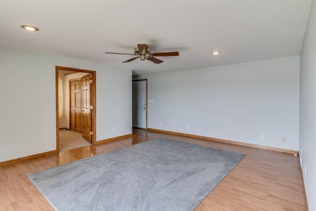 11883 Scott Park Rd, Delton, MI 49046 - unfurnished room featuring ceiling fan, wood finished floors, baseboards, and recessed lighting