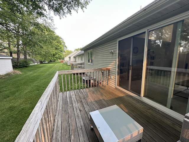 335 Nestlewood Dr, Holland, MI 49424 - wooden deck with a lawn