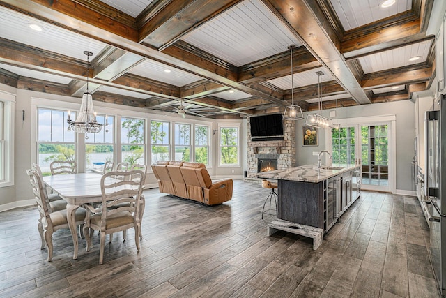 23772 Wilson Rd, Sturgis, MI 49091 - sunroom / solarium with a chandelier, beamed ceiling, plenty of natural light, coffered ceiling, and a sink