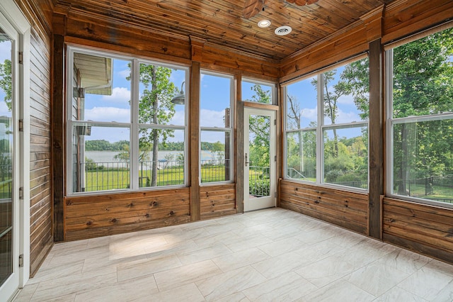 23772 Wilson Rd, Sturgis, MI 49091 - unfurnished sunroom featuring wood walls, a water view, wood ceiling, and healthy amount of natural light