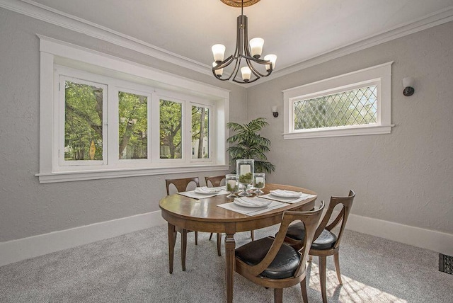 659 Fuller Ave SE, Grand Rapids, MI 49506 - carpeted dining area featuring a chandelier, ornamental molding, and baseboards