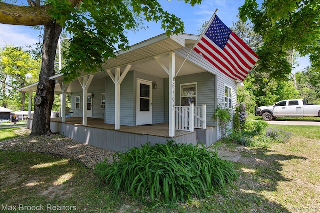 6593 Sherman Dr, Otter Lake, MI 48464 - view of front of property with a porch