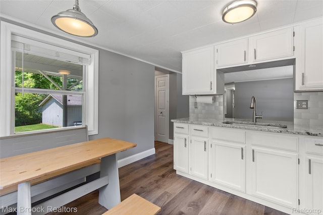 6593 Sherman Dr, Otter Lake, MI 48464 - kitchen with a sink, decorative backsplash, and white cabinets