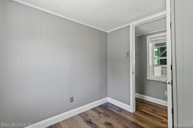 6593 Sherman Dr, Otter Lake, MI 48464 - unfurnished room with dark wood finished floors, ornamental molding, and baseboards