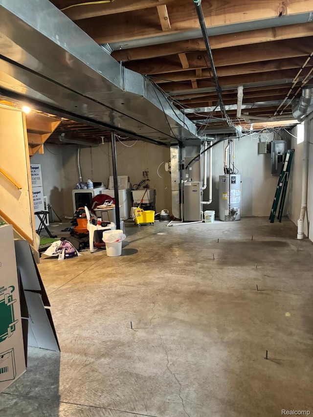 15803 Tireman St, Detroit, MI 48228 - unfinished below grade area featuring heating unit, water heater, and electric panel