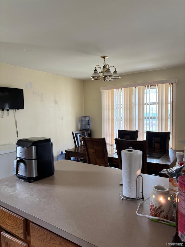 15803 Tireman St, Detroit, MI 48228 - dining space with a chandelier