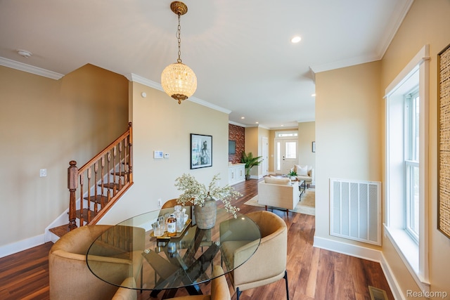 215 W Fifth Ave Unit 2, Flint, MI 48502 - dining room with wood finished floors, ornamental molding, recessed lighting, stairway, and a chandelier