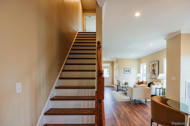 215 W Fifth Ave Unit 2, Flint, MI 48502 - staircase featuring crown molding, wood finished floors, and recessed lighting