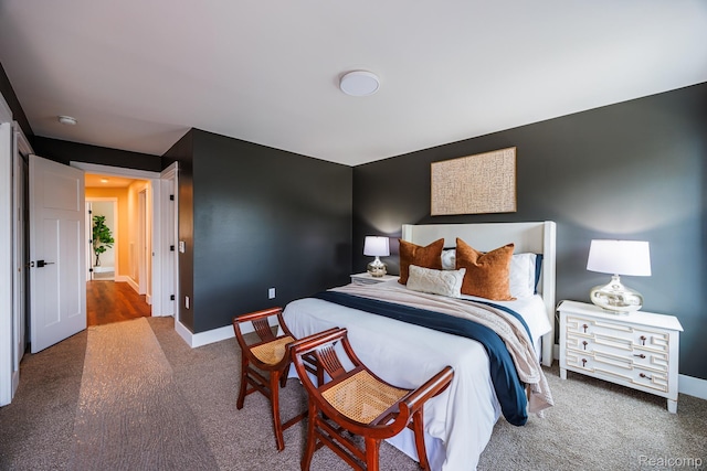 215 W Fifth Ave Unit 2, Flint, MI 48502 - carpeted bedroom featuring baseboards