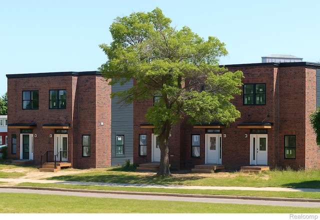 215 W Fifth Ave Unit 2, Flint, MI 48502 - modern home with brick siding