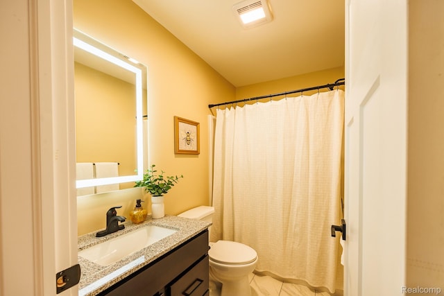 215 W Fifth Ave Unit 2, Flint, MI 48502 - bathroom with vanity, a shower with shower curtain, and tile patterned floors