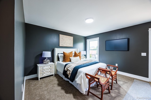 215 W Fifth Ave Unit 2, Flint, MI 48502 - carpeted bedroom with baseboards