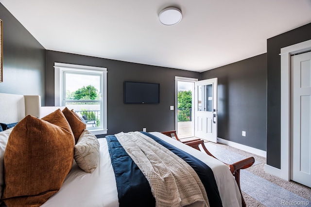 215 W Fifth Ave Unit 2, Flint, MI 48502 - bedroom featuring carpet floors and baseboards