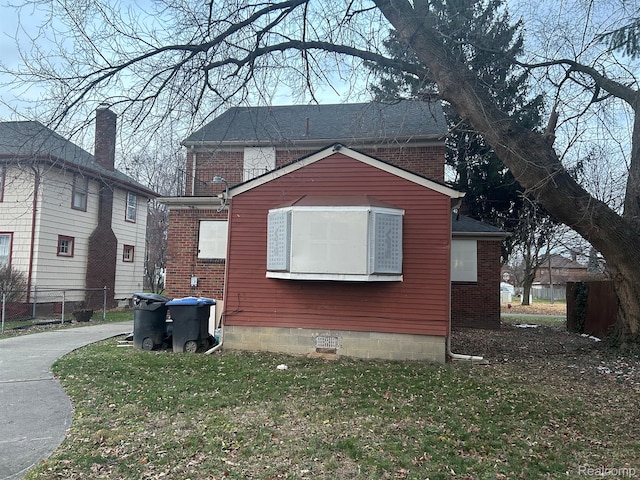 18815 Lancashire St, Detroit, MI 48223 - view of side of property with a yard and brick siding