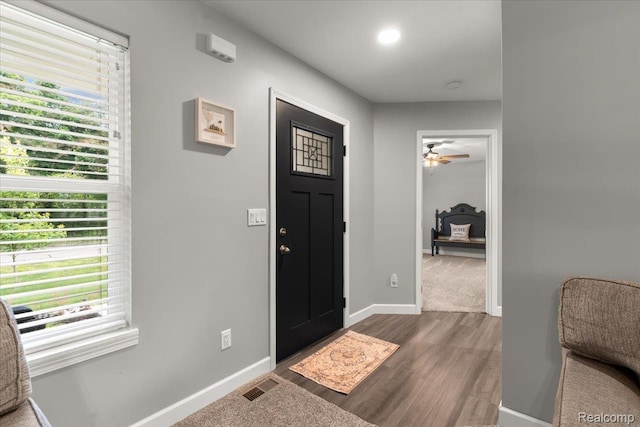 2230 Briar Rdg, Wolverine Lake, MI 48390 - foyer entrance with plenty of natural light, baseboards, wood finished floors, and a ceiling fan
