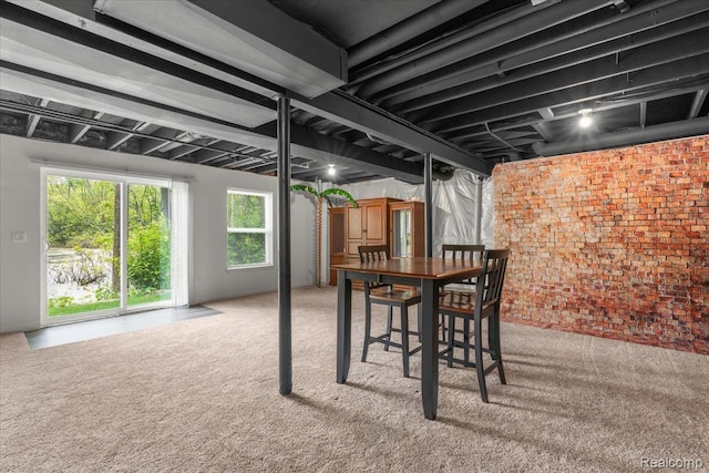 2230 Briar Rdg, Wolverine Lake, MI 48390 - carpeted dining space with brick wall