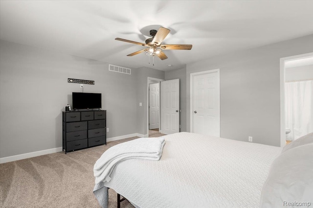 2230 Briar Rdg, Wolverine Lake, MI 48390 - bedroom with baseboards, light carpet, ensuite bath, and ceiling fan