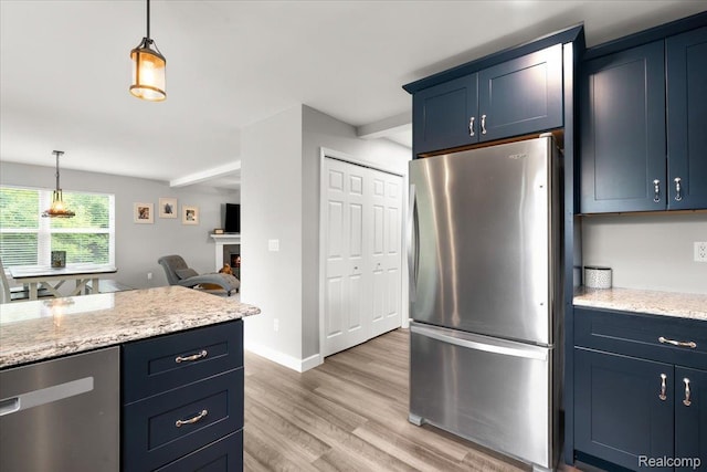 2230 Briar Rdg, Wolverine Lake, MI 48390 - kitchen with appliances with stainless steel finishes, blue cabinetry, light wood-style floors, hanging light fixtures, and baseboards