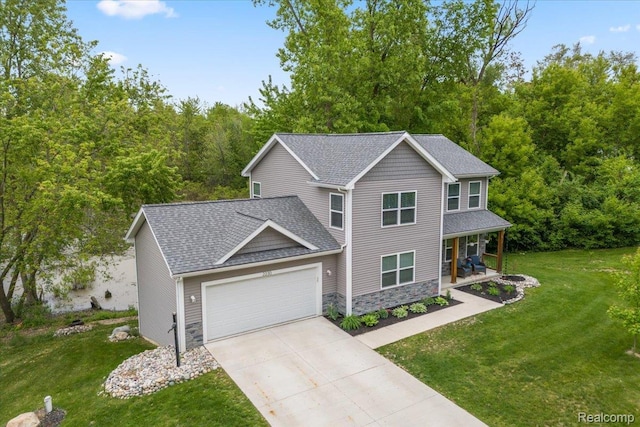 2230 Briar Rdg, Wolverine Lake, MI 48390 - view of front of home featuring covered porch, an attached garage, stone siding, and a front yard