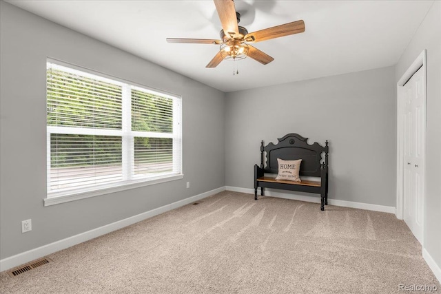2230 Briar Rdg, Wolverine Lake, MI 48390 - bedroom featuring light carpet, multiple windows, baseboards, and a closet