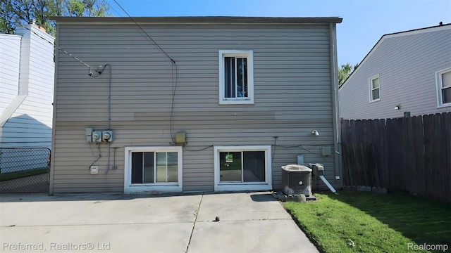 8483 Harding, Center Line, MI 48015 - rear view of property featuring central air condition unit and a patio