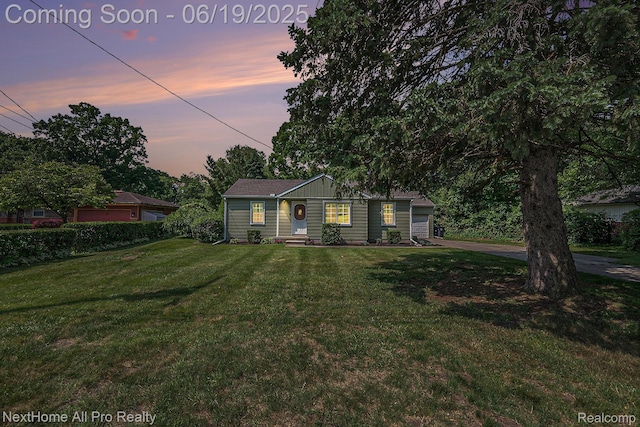 36551 Parkdale St, Livonia, MI 48150 - single story home with a front lawn, concrete driveway, and an attached garage