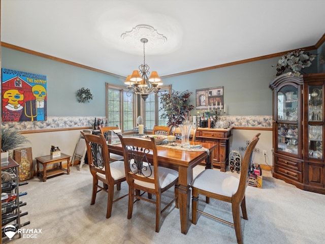 9705 Burning Tree Dr, Grand Blanc, MI 48439 - carpeted dining space featuring a chandelier, ornamental molding, and wainscoting