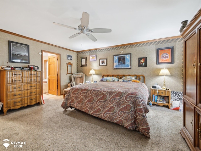 9705 Burning Tree Dr, Grand Blanc, MI 48439 - bedroom with carpet floors, ornamental molding, ensuite bathroom, and a ceiling fan