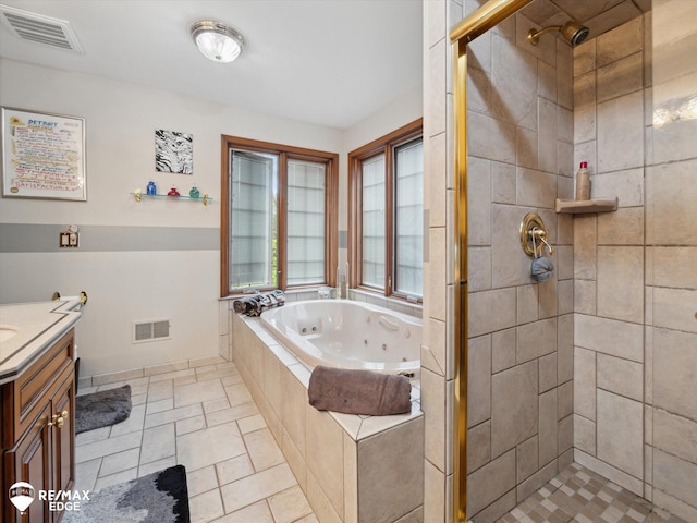 9705 Burning Tree Dr, Grand Blanc, MI 48439 - full bath with a shower stall, a whirlpool tub, and vanity