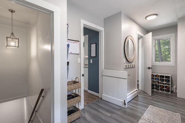 8680 Bennett St SE, Ada, MI 49301 - hall featuring wood finished floors and baseboards